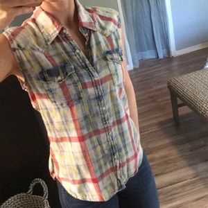 True Religion sleeveless snap up top.